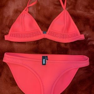 Red triangle bathing suit